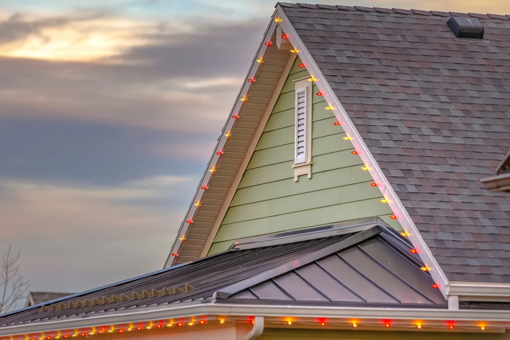 Outdoor lighting installation on a home exterior